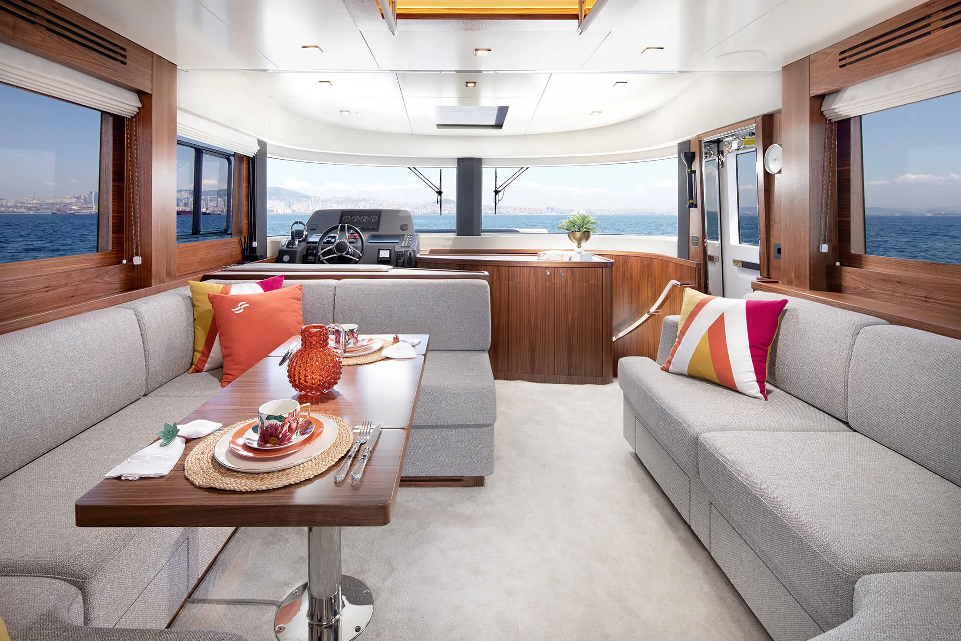 Saloon looking forward to the lower helm and panoramic windscreen
